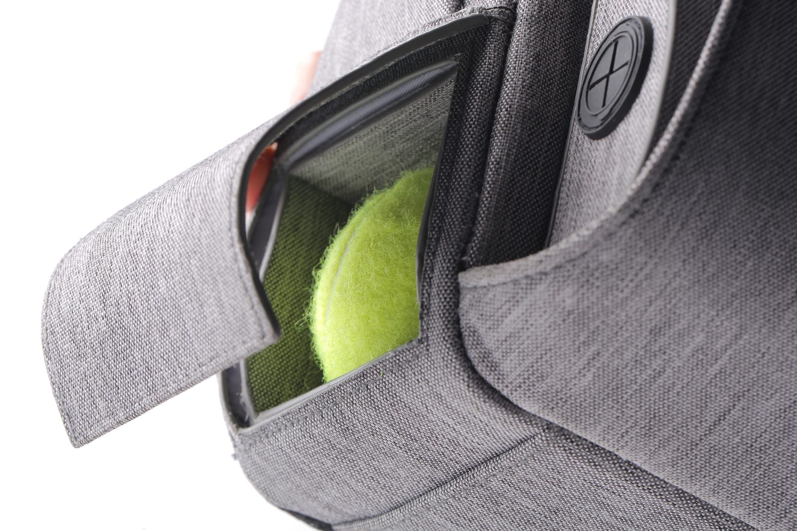 SixWalker Sling pocket holding a tennis ball